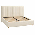 Cama doble tapizada en tela poliéster beige con cabecero acolchado